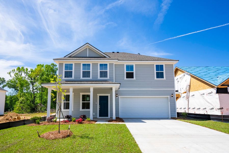 Front exterior of a new home in Monroe Preserve, Chapin, SC, highlighting curb appeal (Image 24).