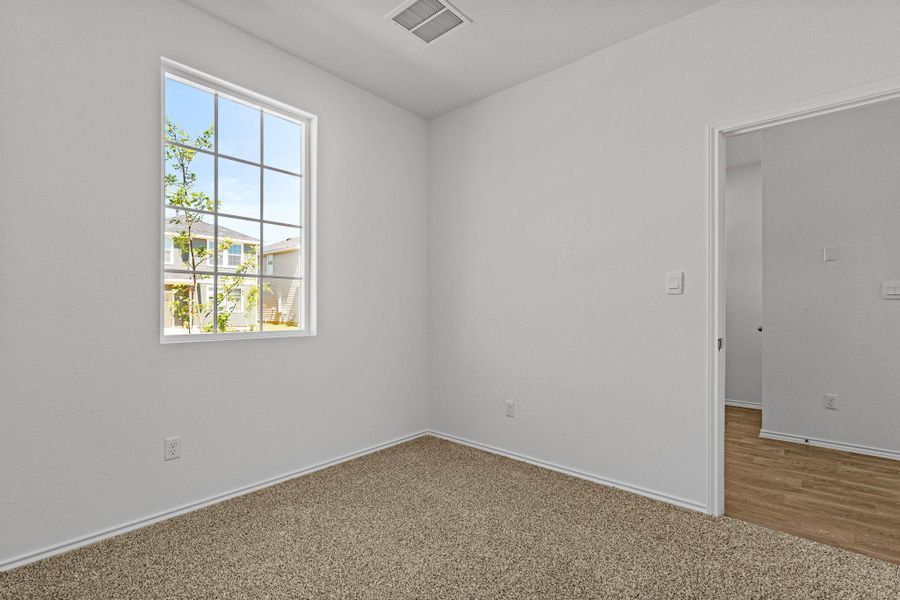 Spacious, unfurnished interior of a new home in Valverde, Bastrop (Image 34).