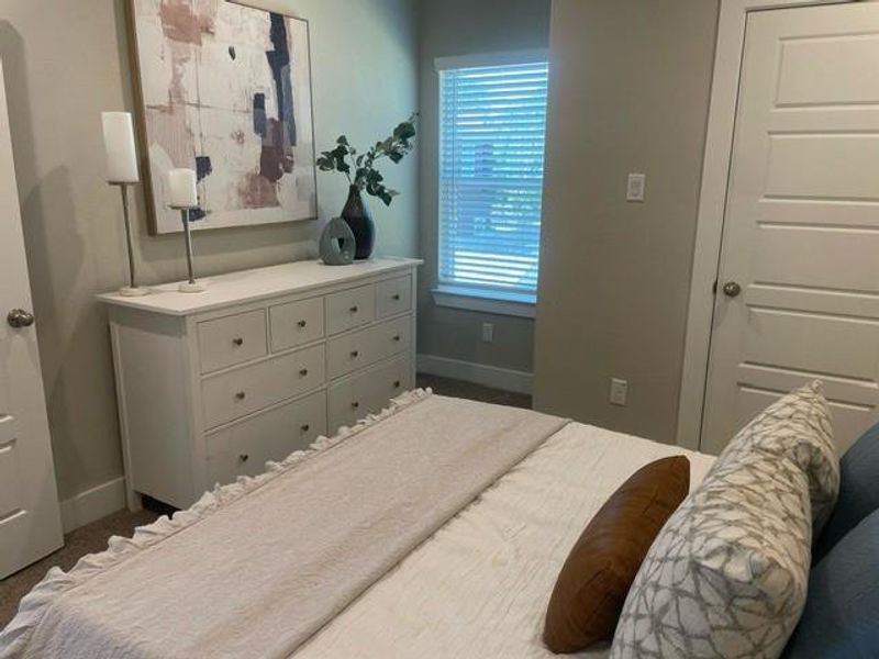 secondary bedroom with en suite bath