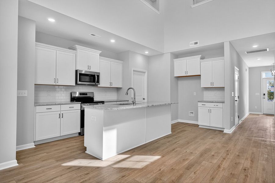 Furnished interior view inside a new home in Grand Park, Leland (Image 6). Furnished interior view inside a new home in Grand Park, Leland (Image 6).