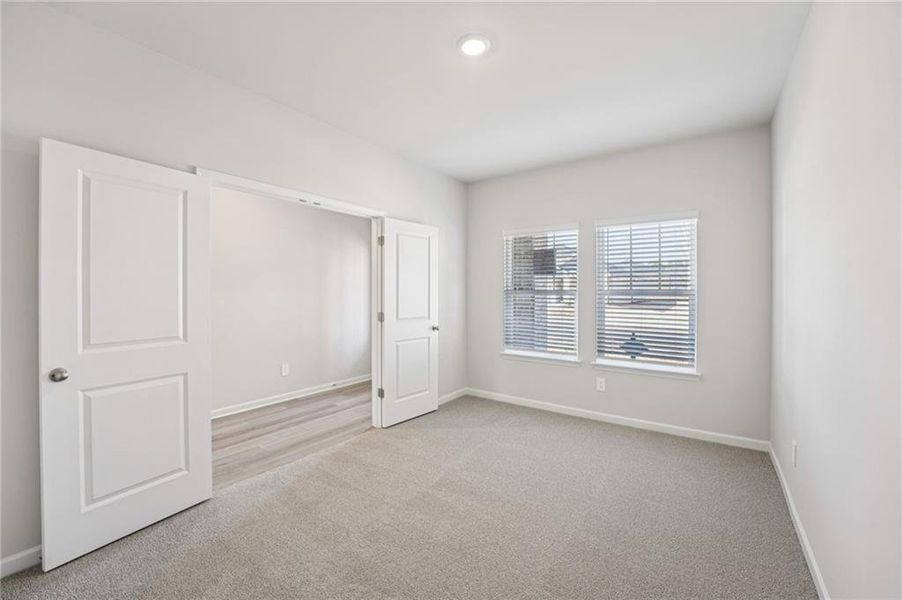 Spacious, unfurnished interior of a new home in Creekside at Oxford Park, Fairburn (Image 47).