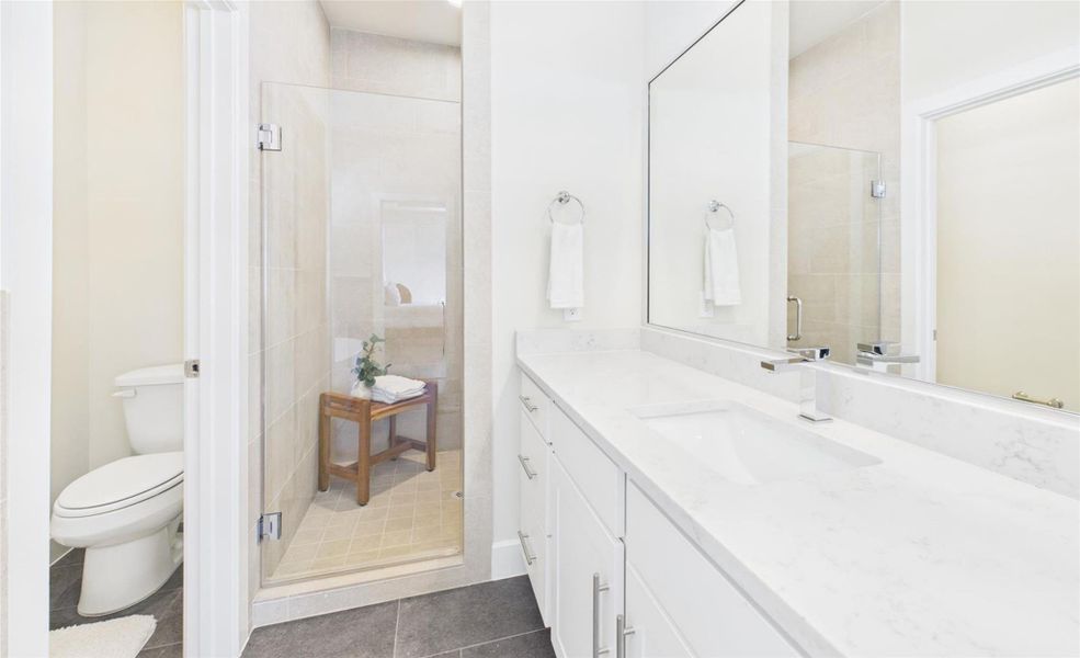 Large glass encased shower in the primary bath