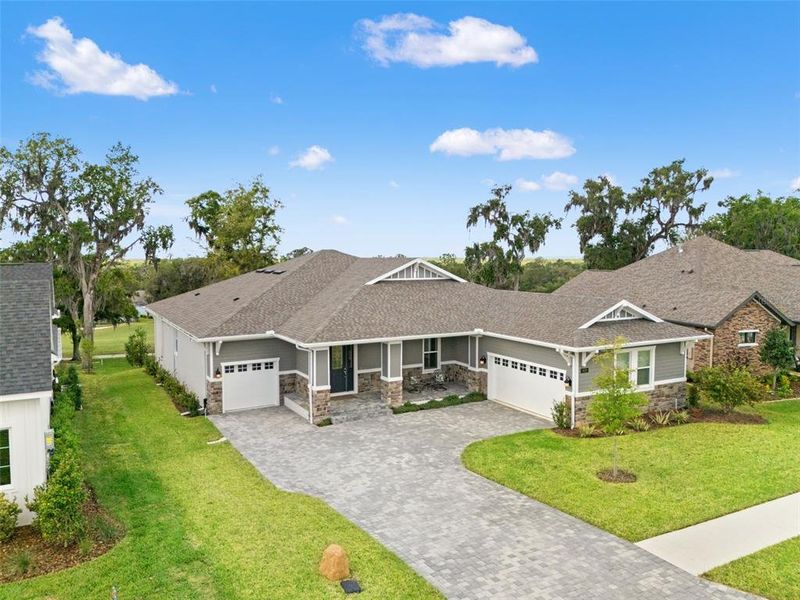 Front exterior of a new home in , Brooksville, FL, highlighting curb appeal (Image 25).