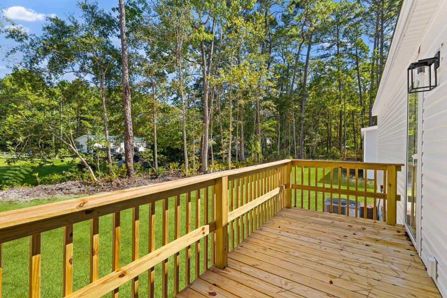 Exterior details and patio area of a home in , Ravenel (Image 3). Exterior details and patio area of a home in , Ravenel (Image 3).