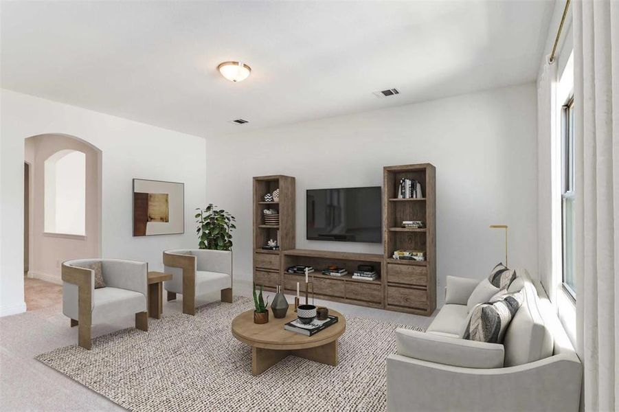 Living area with carpet flooring and arched walkways Living area with carpet flooring and arched walkways