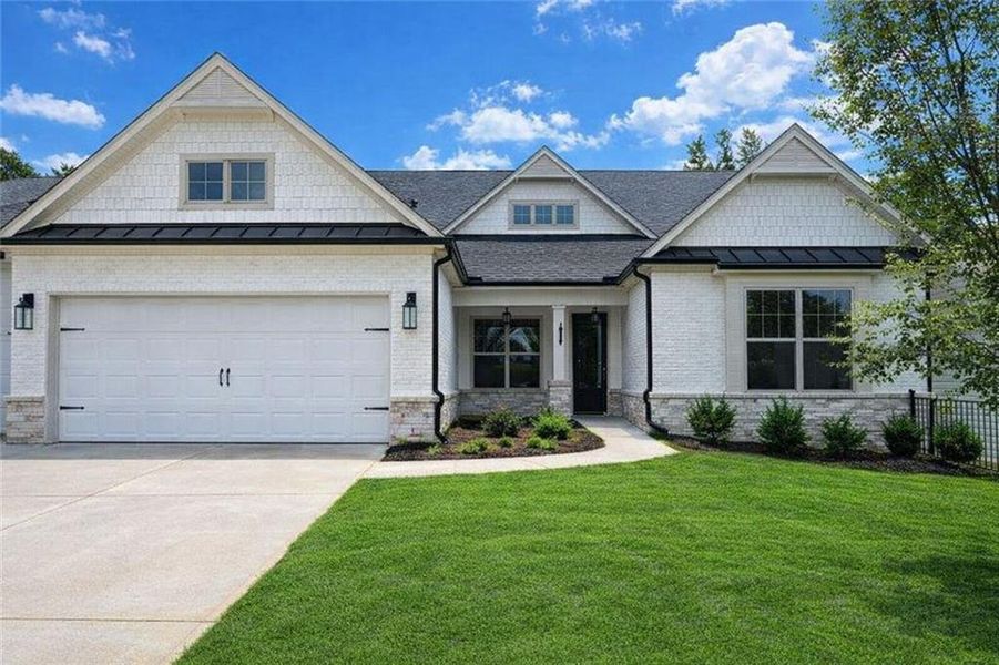 Front exterior of a new home in Soleil Belmont Park, Canton, GA, highlighting curb appeal (Image 1). Front exterior of a new home in Soleil Belmont Park, Canton, GA, highlighting curb appeal (Image 1).