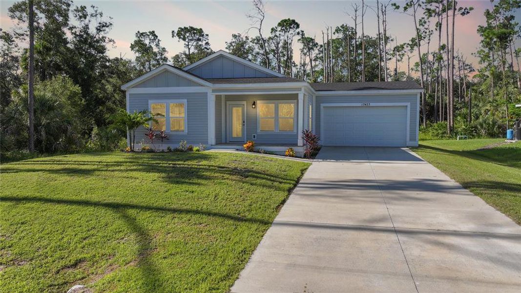 Front exterior of a new home in , Port Charlotte, FL, highlighting curb appeal (Image 19).