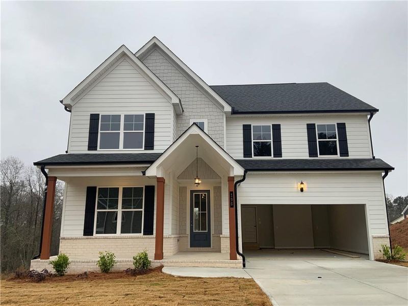 Front exterior of a new home in , Commerce, GA, highlighting curb appeal (Image 13). Front exterior of a new home in , Commerce, GA, highlighting curb appeal (Image 13).