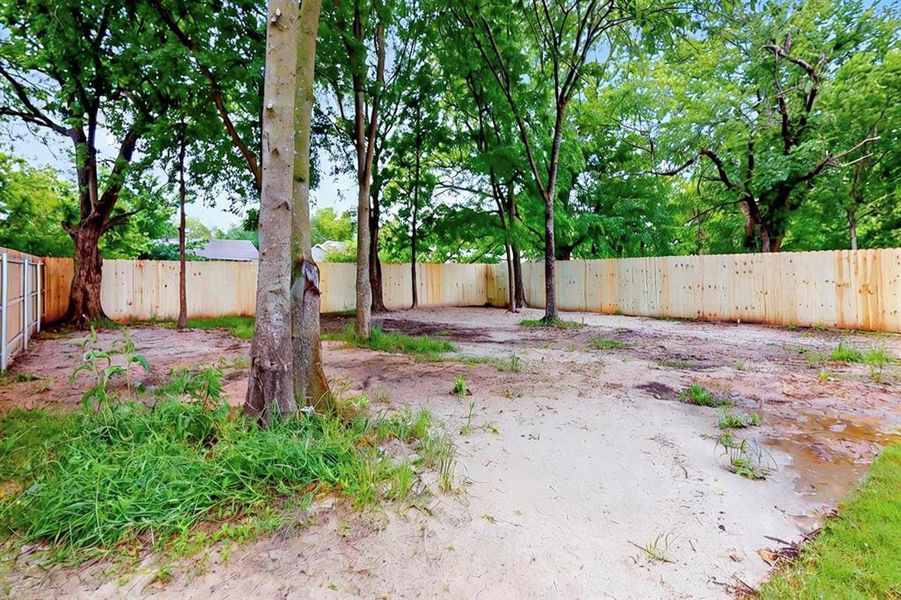 View of yard featuring a fenced backyard View of yard featuring a fenced backyard