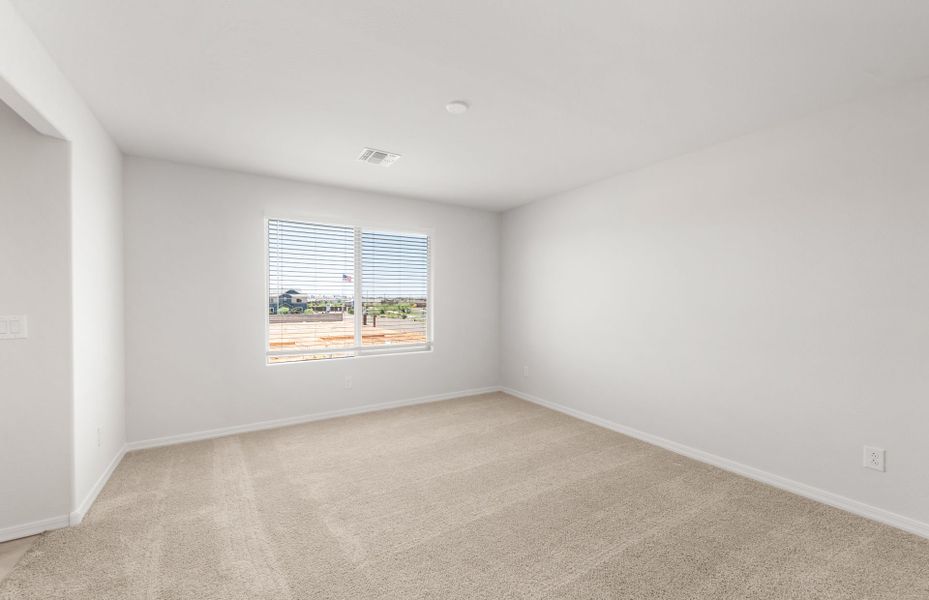 Spacious, unfurnished interior of a new home in Asante- Atrium Series, Surprise (Image 15).