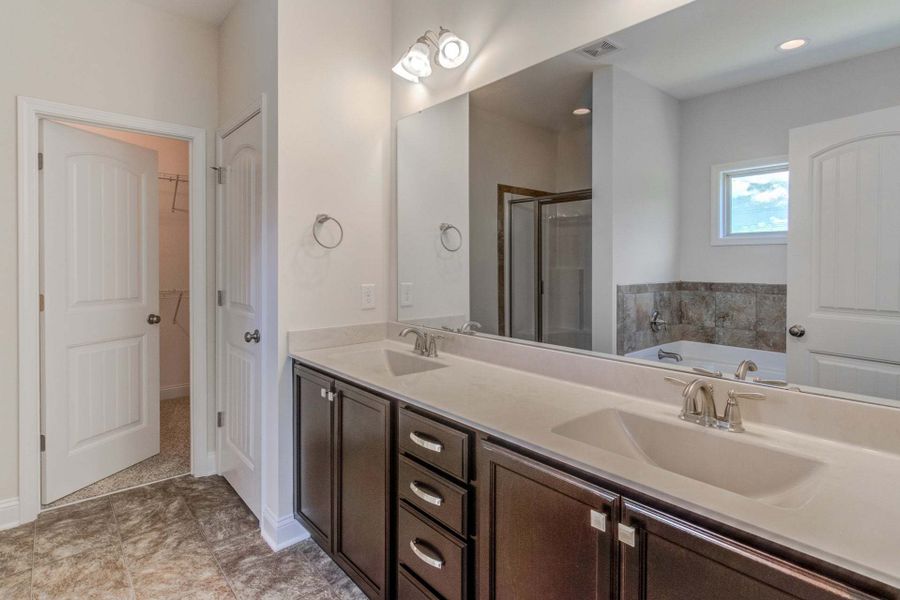 Representative furnished interior of a home built from the Clayton by Caviness & Cates Communities in Bartlett Manor, Youngsville (Image 191).