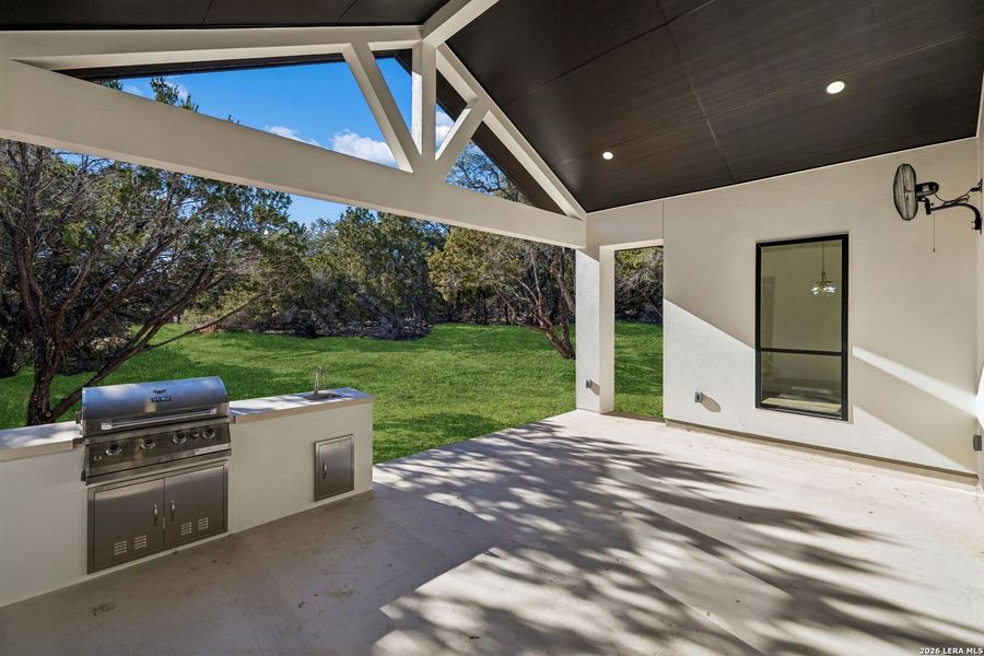 Exterior details and patio area of a home in , Spring Branch (Image 39).