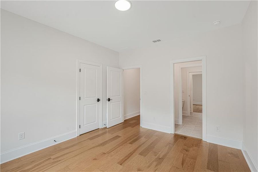 Spacious, unfurnished interior of a new home in Bellwyn, Johns Creek (Image 59).