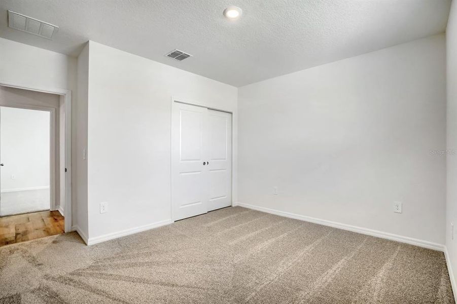 Spacious, unfurnished interior of a new home in Salt Meadows - Classic Series, Parrish (Image 27).