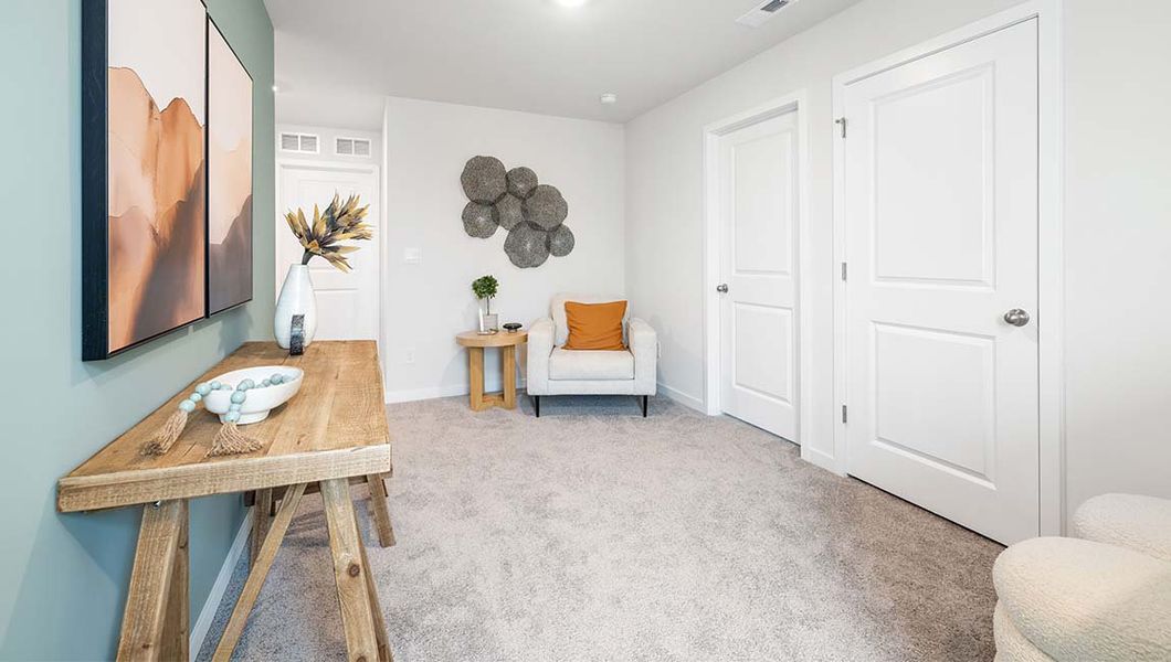 Furnished interior view inside a new home in Reedy Creek Preserve, Charlotte (Image 27).