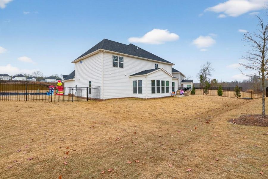 Exterior details and patio area of a home in Reunion, Flowery Branch (Image 27). Exterior details and patio area of a home in Reunion, Flowery Branch (Image 27).