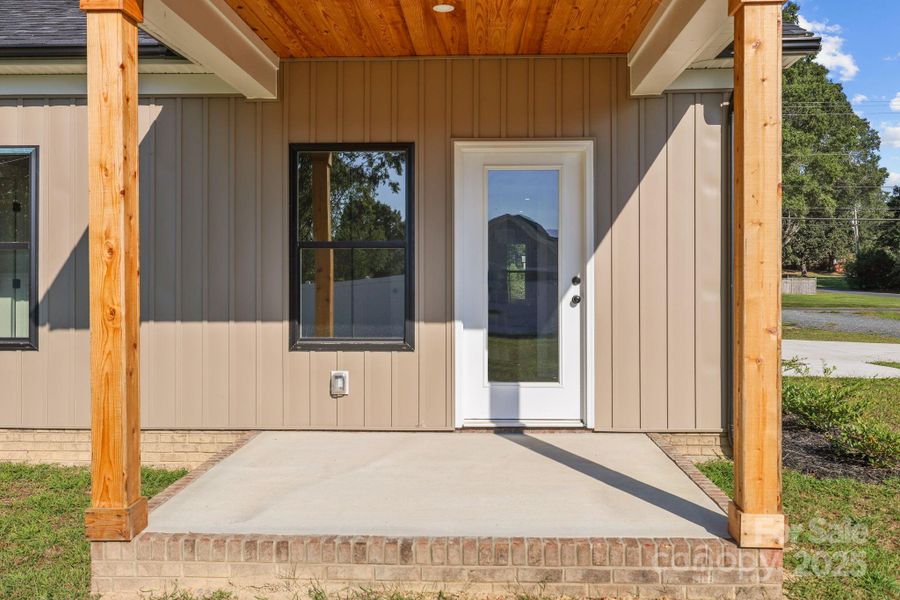 Front exterior of a new home in , Albemarle, NC, highlighting curb appeal (Image 19).