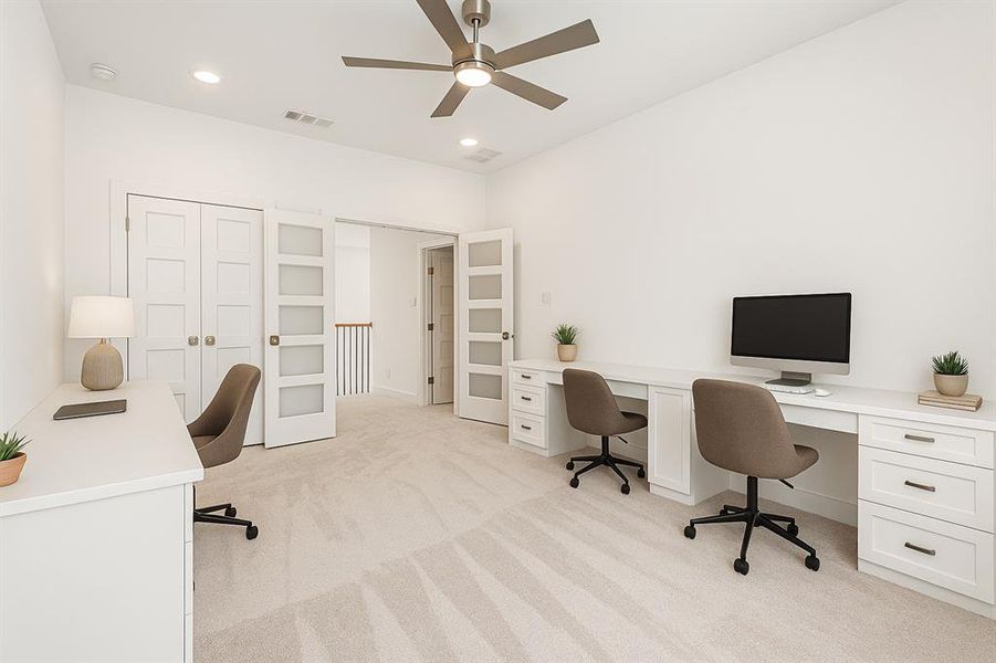 Office featuring light carpet, ceiling fan, and recessed lighting