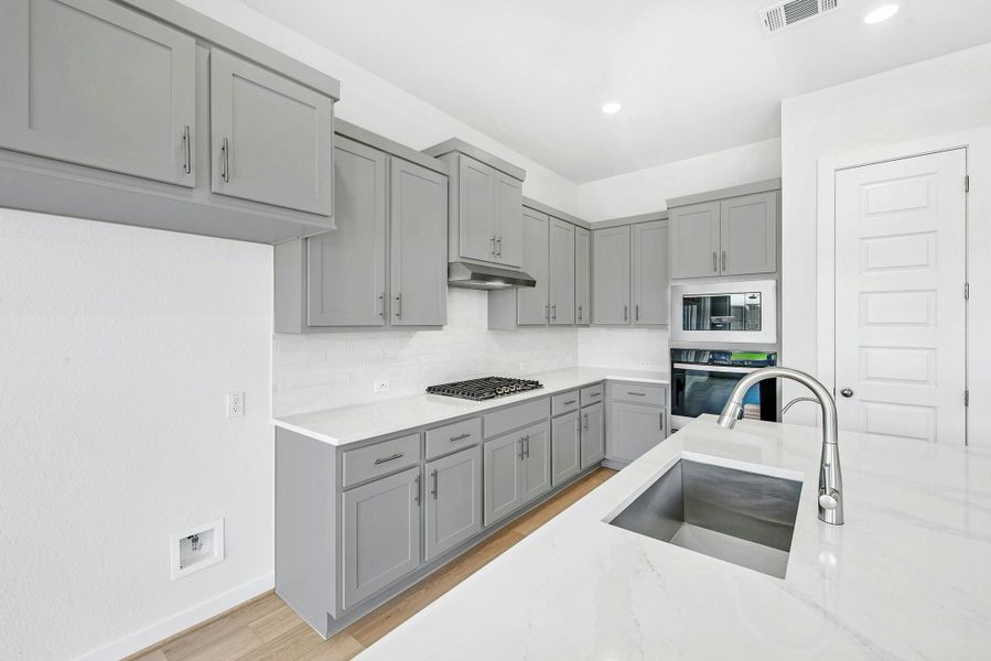 Furnished interior view inside a new home in The Colony, Bastrop (Image 8). Furnished interior view inside a new home in The Colony, Bastrop (Image 8).
