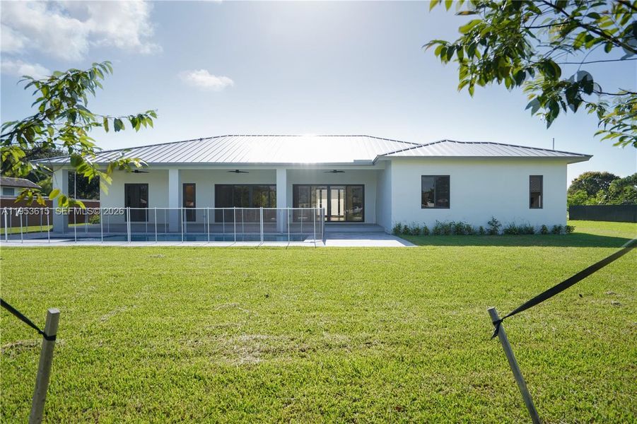 Exterior details and patio area of a home in , Homestead (Image 25). Exterior details and patio area of a home in , Homestead (Image 25).