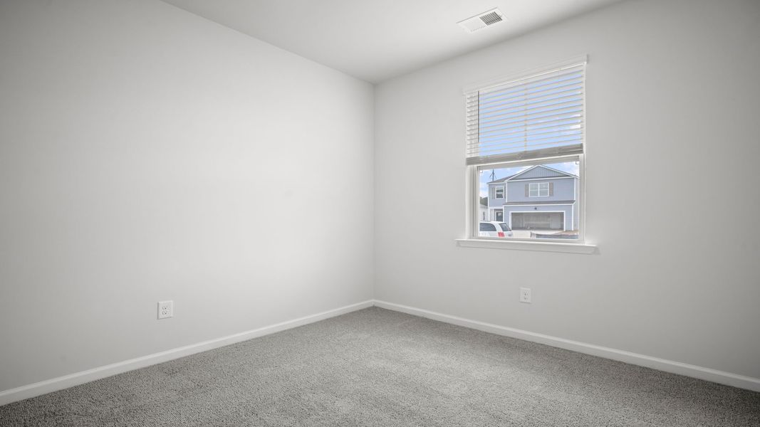 Spacious, unfurnished interior of a new home in The Retreat at East Argent, Ridgeland (Image 20).