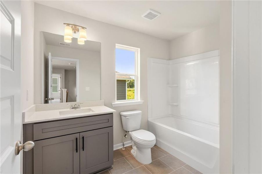 Furnished interior view inside a new home in The Brooke at Rivertown, South Fulton (Image 12).