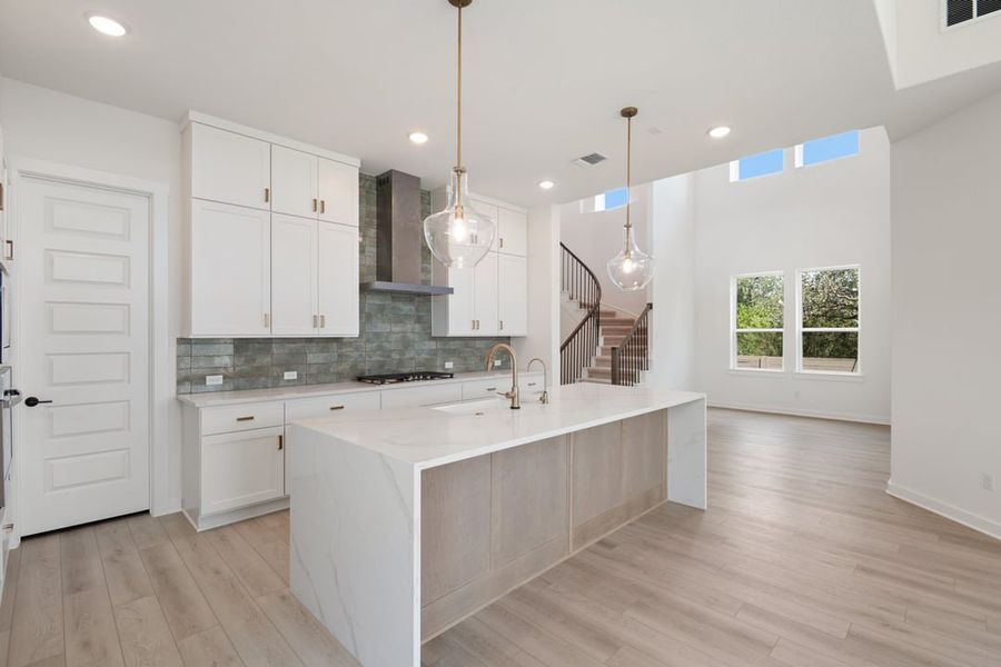 Furnished interior view inside a new home in Arbor Collection At Wolf Ranch, Georgetown (Image 11).