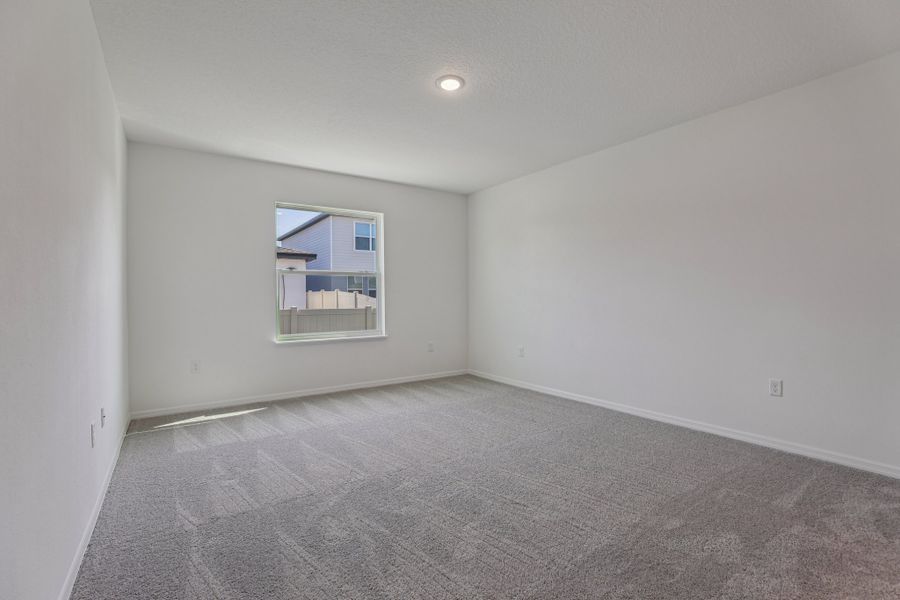 Representative unfurnished interior of a home built from the Vista by Maronda Homes in Heritage Station, Punta Gorda (Image 31).