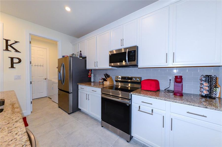 Furnished interior view inside a new home in , North Port (Image 12).
