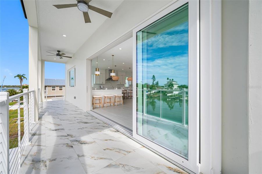 Exterior details and patio area of a home in , Madeira Beach (Image 1).