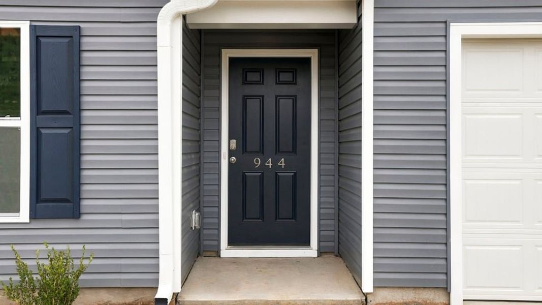 Exterior details and patio area of a home in Lakestone, Woodruff (Image 4).