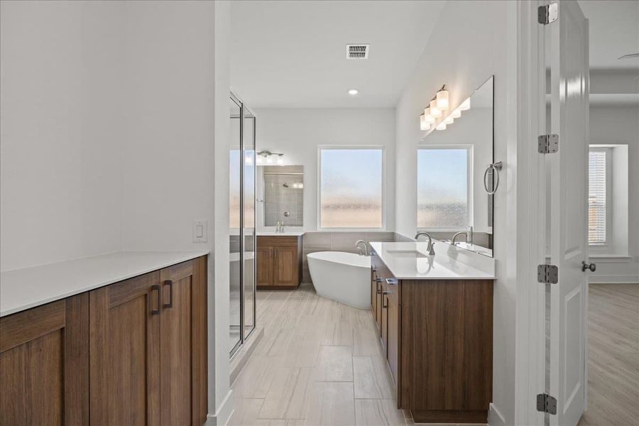 Furnished interior view inside a new home in Village at Three Oaks, Seguin (Image 12).
