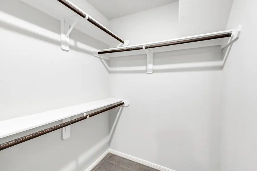 Representative unfurnished interior of a home built from the Floor Plan 1597 by Colina Homes in Rollingbrook Estates, Baytown (Image 26).