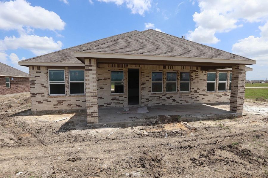 Backyard with covered patio - still under construction!