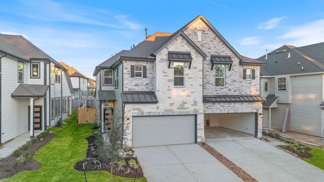 Front exterior of a new home in Woodforest, Montgomery, TX, highlighting curb appeal (Image 1). Front exterior of a new home in Woodforest, Montgomery, TX, highlighting curb appeal (Image 1).