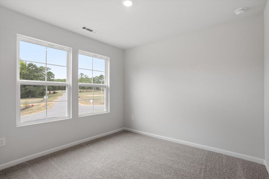 Spacious, unfurnished interior of a new home in Cambridge Reserve, Angier (Image 26).