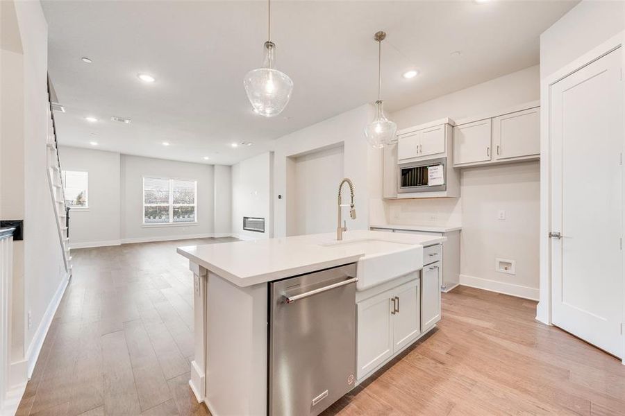 Furnished interior view inside a new home in Collin Creek, Plano (Image 8).