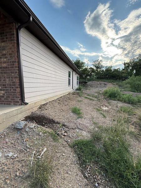 Exterior details and patio area of a home in , Runaway Bay (Image 4).