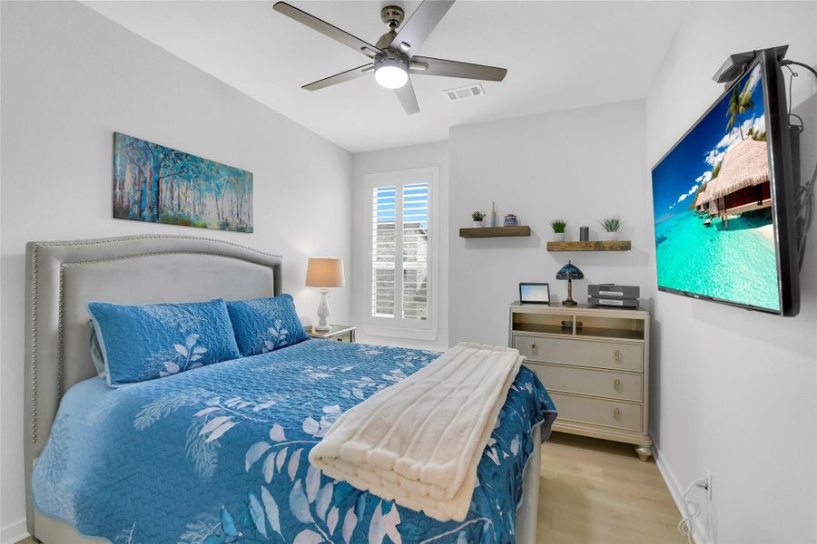 Upstairs secondary bedroom with private ensuite bath.