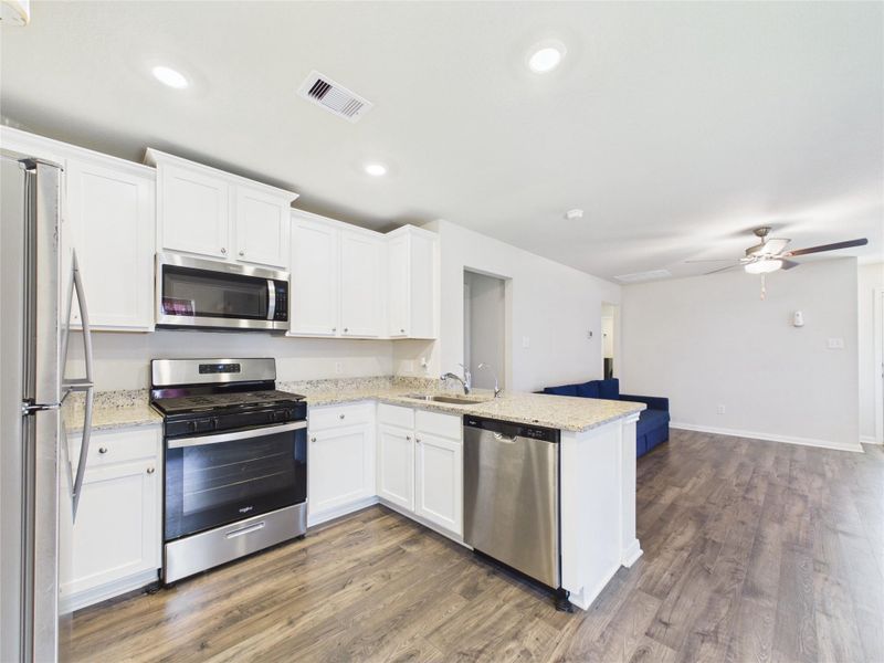Furnished interior view inside a new home in Park Vista at El Tesoro, Houston (Image 19).