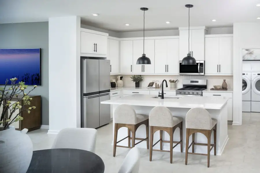 Furnished interior view inside a new home in RiverTown - WaterSong, St. Johns (Image 8).