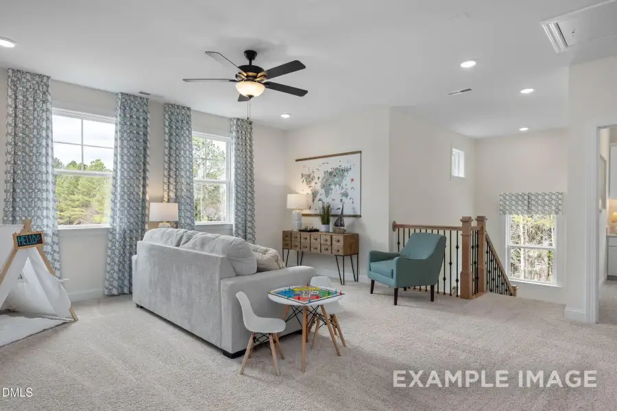 Furnished interior view inside a new home in Addison West, Holly Springs (Image 14).