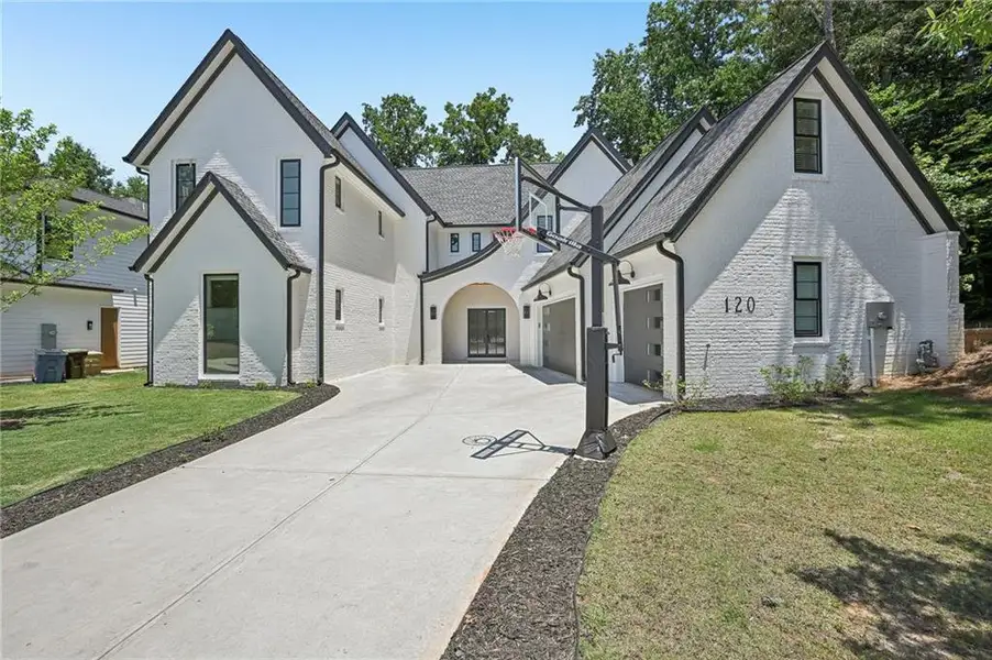 Front exterior of a new home in , Alpharetta, GA, highlighting curb appeal (Image 2). Front exterior of a new home in , Alpharetta, GA, highlighting curb appeal (Image 2).