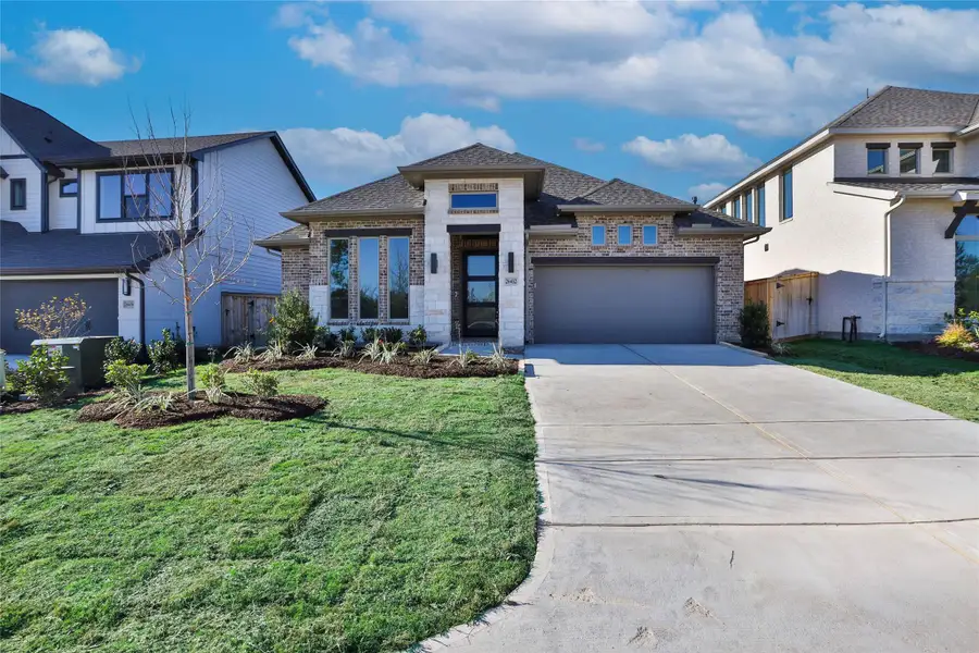 Front exterior of a new home in Kresston, Magnolia, TX, highlighting curb appeal (Image 2).
