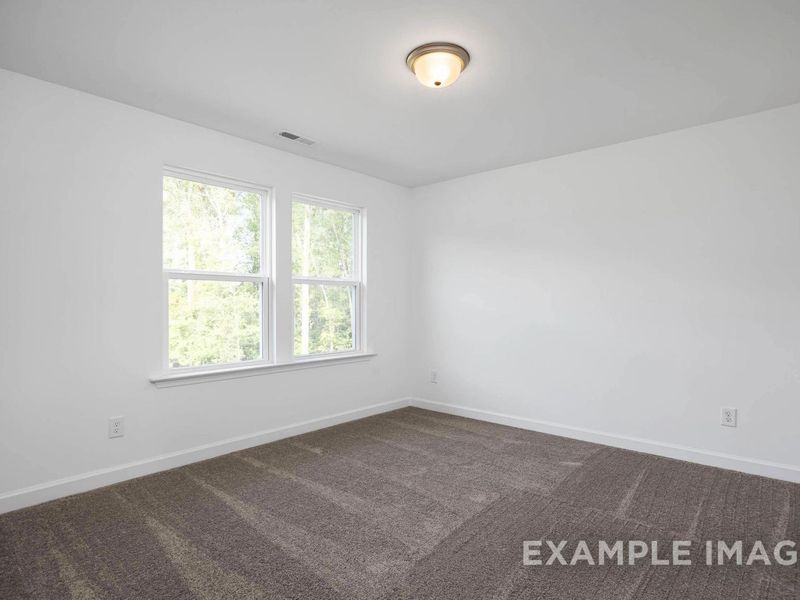 Spacious, unfurnished interior of a new home in Woodland Crossing, Zebulon (Image 24).