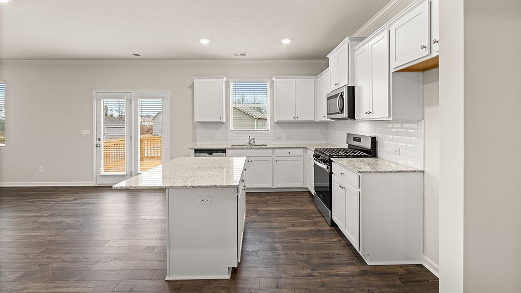 Representative furnished interior of a home built from the Mansfield by D.R. Horton in Northwoods at Mirror Lake, Villa Rica (Image 6).