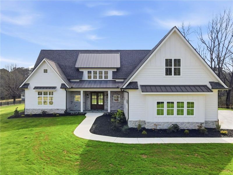 Front exterior of a new home in , Canton, GA, highlighting curb appeal (Image 29).