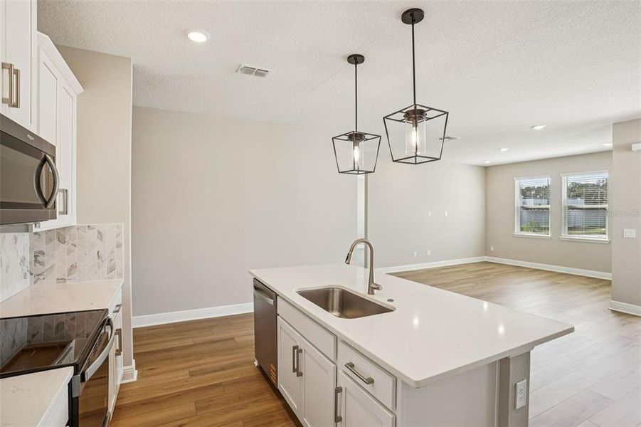 Furnished interior view inside a new home in Legends Preserve - Signature Series, Daytona Beach (Image 10).