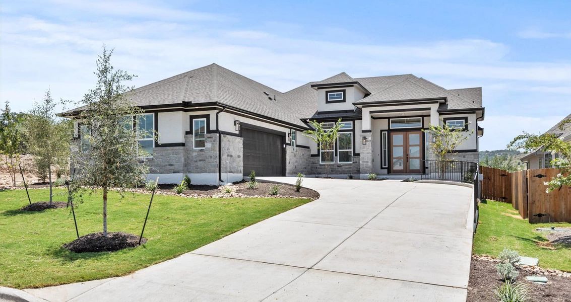 Representative exterior photo of a completed home built from the Everly by Chesmar Homes in Sweetwater, Austin, TX (Image 1).