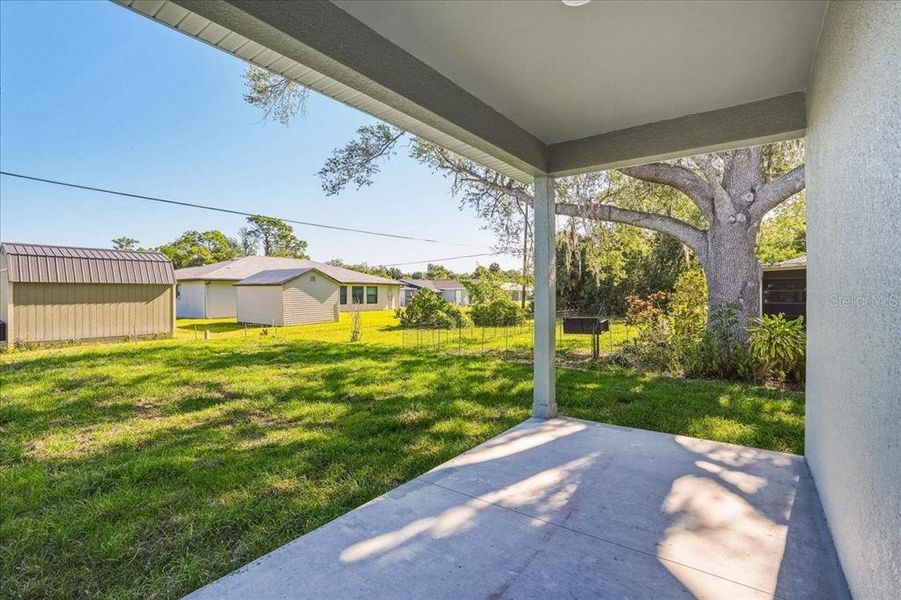 Exterior details and patio area of a home in , Port Charlotte (Image 28).